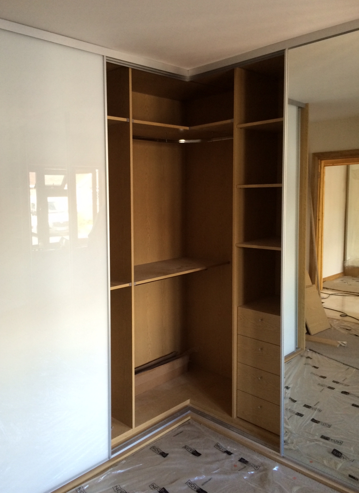 Corner & L shaped sliding wardrobes